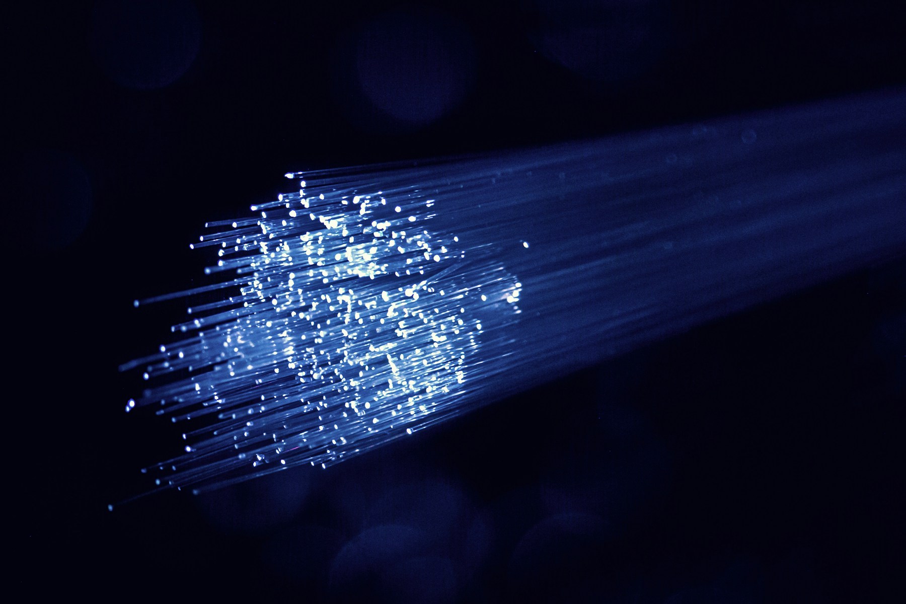Illuminated fibre-optic strands carrying high-speed broadband data